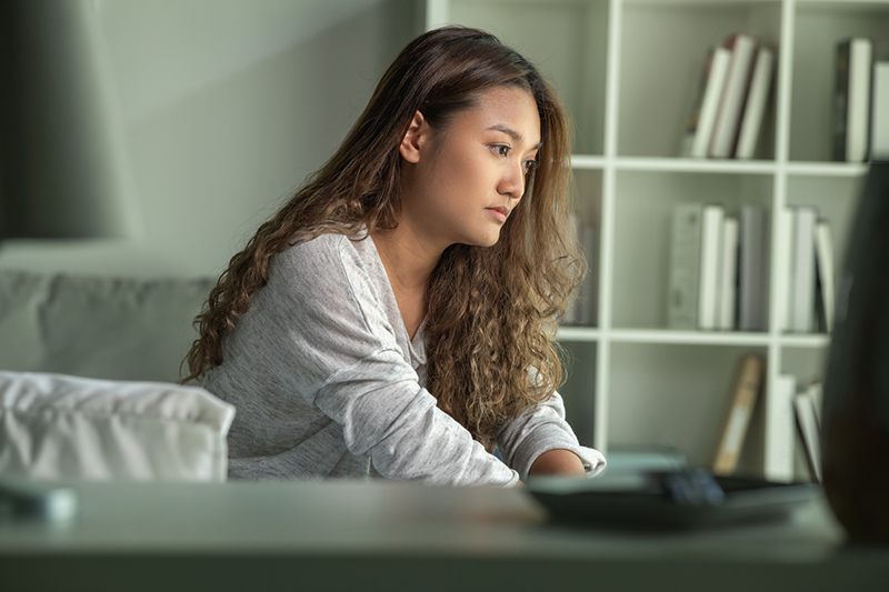 woman completing form